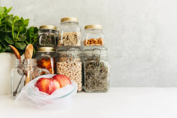 Food set. Raw cereals, pasta, groats, organic legumes and useful seeds in glass jars. — Stock Photo, Image