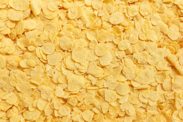 Tło żółte płatki kukurydziane — Zdjęcie stockowe