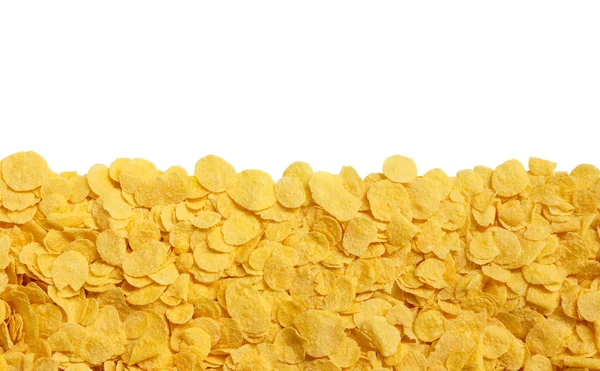 Żółty chrupiące płatki kukurydziane na białym tle — Zdjęcie stockowe