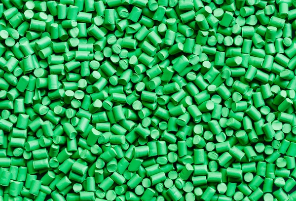 Green plastic resin ( Masterbatch ) background — Stock Photo, Image