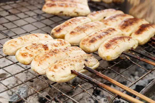 Grilled banana skewers on stove — Stock Photo, Image