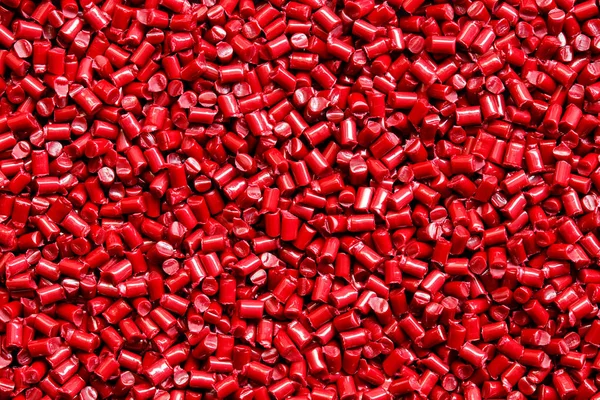 Red plastic resin ( Masterbatch ) background — Stock Photo, Image
