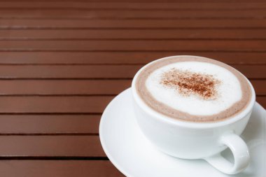 ahşap masa arka plan üzerinde kopya alanı ile sıcak çikolata