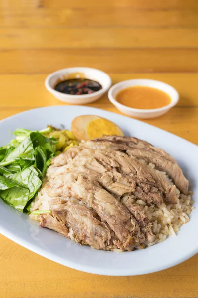 Stewed pork leg on rice — Stock Photo, Image