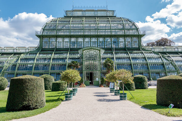 Austria, Vienna - September 3, 2019: Botanical Garden Palmenhaus Schonbrunn is a large greenhouse located in schonbrunn palace garden in vienna, austria.