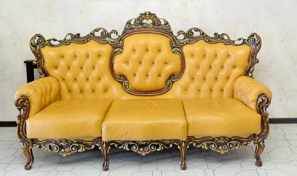 Sofa in classic style bright yellow color — Stock Photo, Image