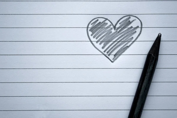 Pencil heart on a sheet of paper — Stock Photo, Image