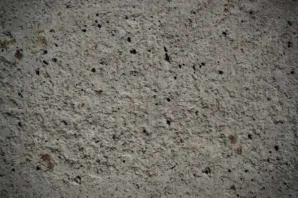 Szorstka faktura porowatego betonu w szczegółach — Zdjęcie stockowe