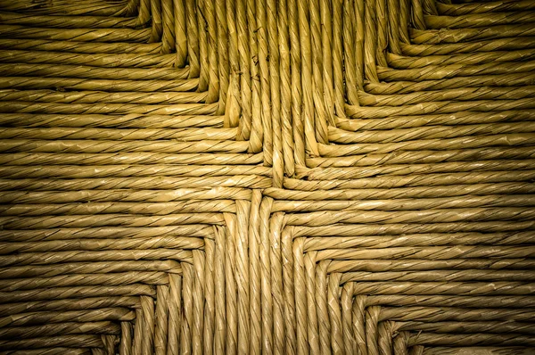 Beautiful weaving with a pattern of dry straw — Stock Photo, Image