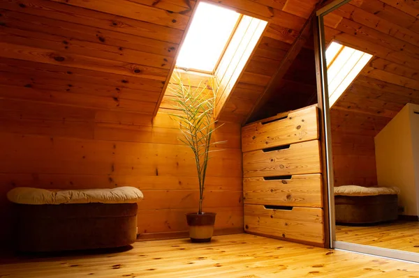 Wooden loft interior with skylight — Stock Photo, Image