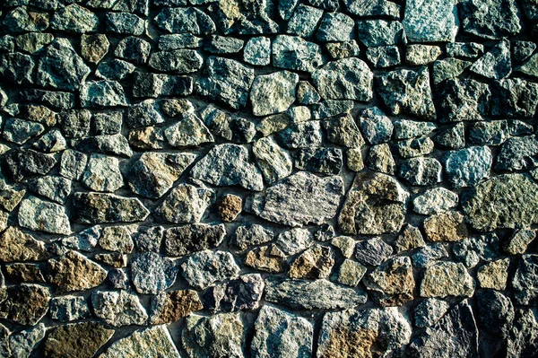Wand aus groben Felsbrocken — Stockfoto