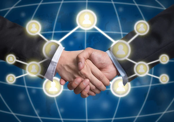 Business handshake z symbolami Social media — Zdjęcie stockowe