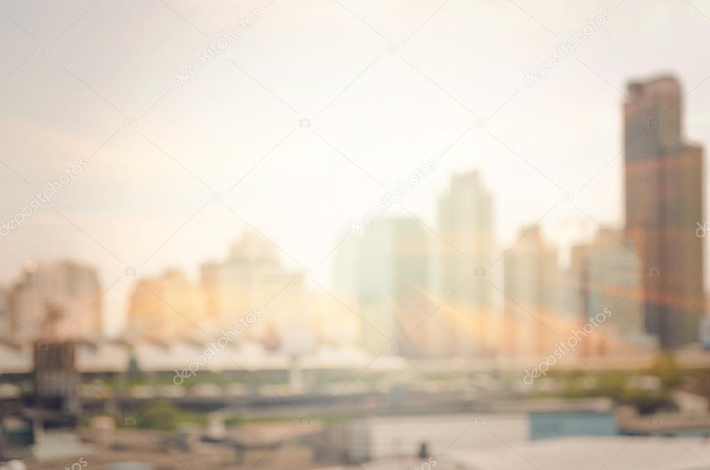 Cityscape with sun background