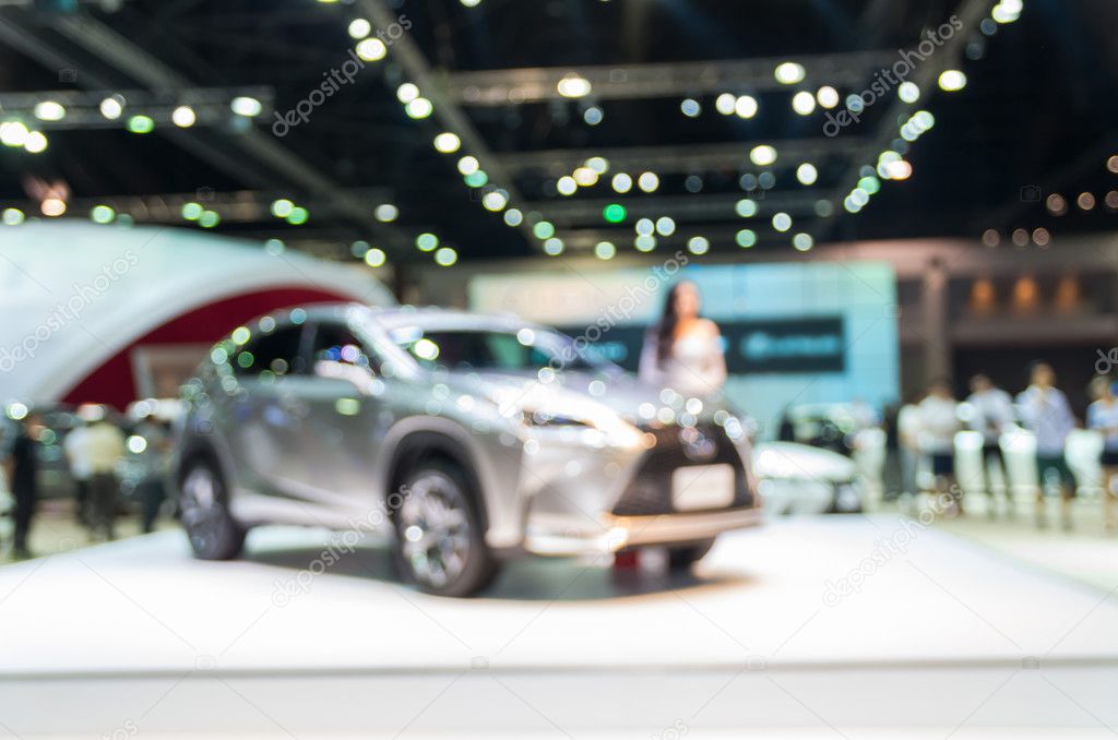 blurred photo of motor show