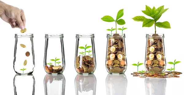 Bottle with different coins — Stock Photo, Image