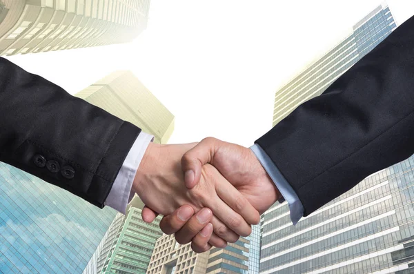 Handshake between a businessmen — Stock Photo, Image