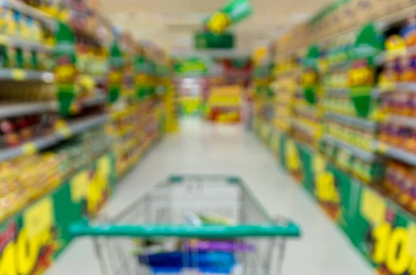 Store with trolley in department store — Stock Photo, Image