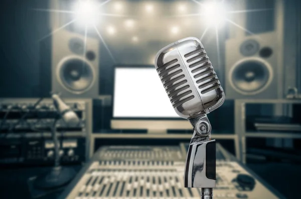 Retro microphone over the photo blurred — Stock Photo, Image