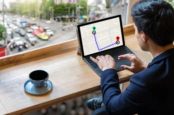 Businessman sitting and using computer — Stock Photo, Image