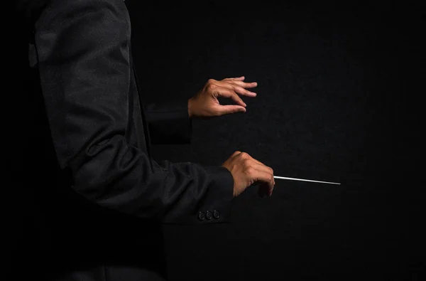 Orchestra conductor hands