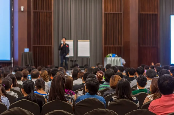 Speaker on the stage with Rear view — Stock Photo, Image