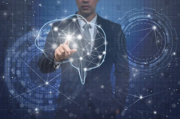 Businessman hand pointing the brain — Stock Photo, Image