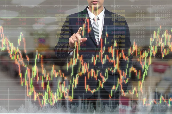 Businessman pointing the stock graph — Stock Photo, Image