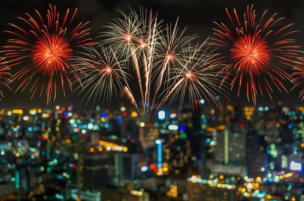 Multicolor fireworks with cityscape — Stock Photo, Image