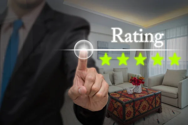 Businessman pointing five star button — Stock Photo, Image