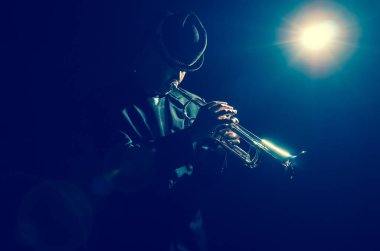 Musician playing the Trumpet clipart