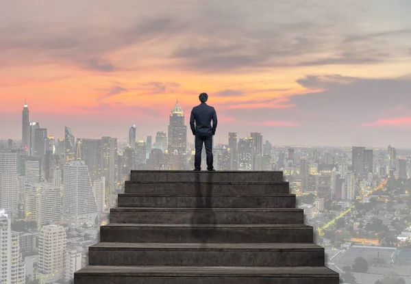 Businessman standing for walking up stairs — Stock Photo, Image