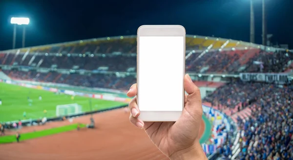 Mano femenina sosteniendo teléfono móvil inteligente — Foto de Stock