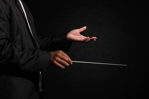 Orchestra conductor hands