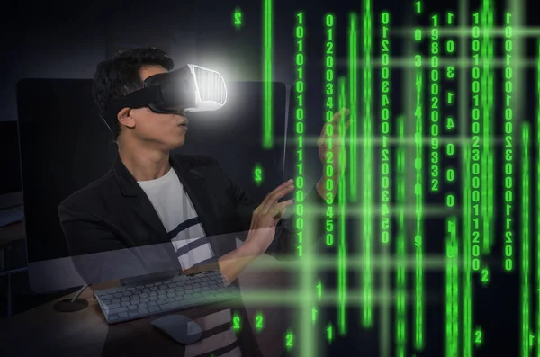 Asian man wearing virtual reality