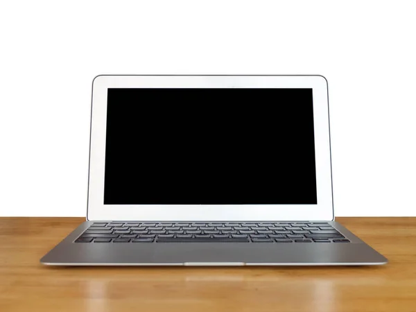 Laptop on the wooden table — Stock Photo, Image