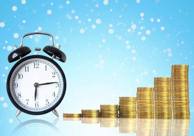 altın sikke ve vintage saat 