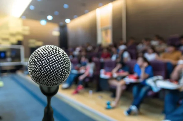 Microphone over conference hall interior — Stock Photo, Image