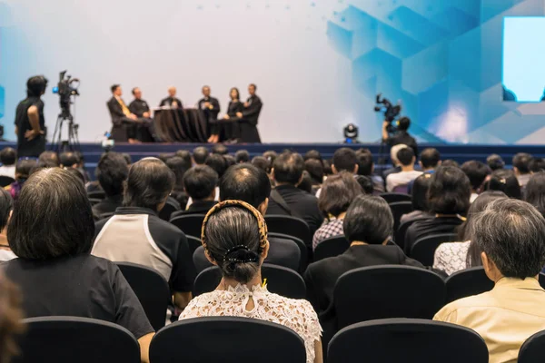 Speakers on the stage in conference hall — Stock Photo, Image