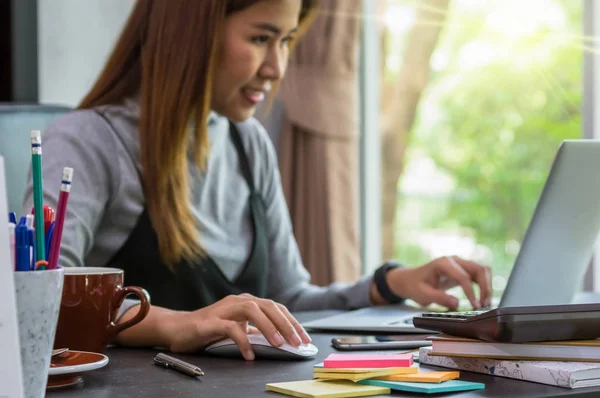 Young businesswoman work at home