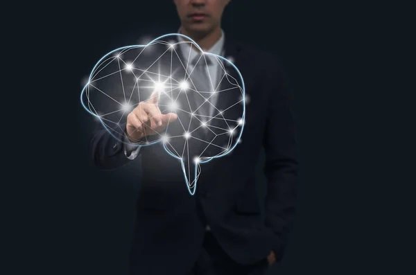 Businessman hand pointing the brain — Stock Photo, Image