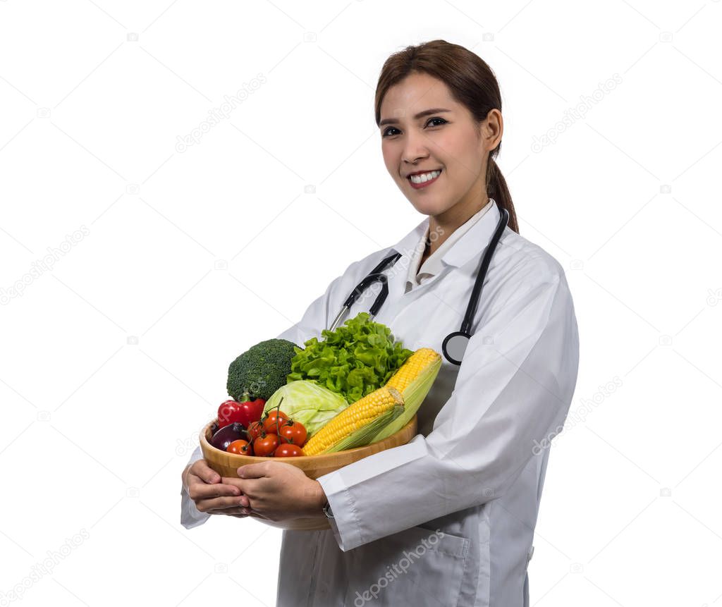 young doctor holding fresh vegetables