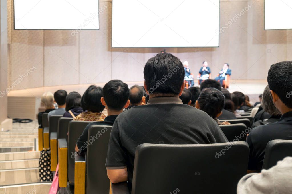 Rear view of Audience over the speakers 