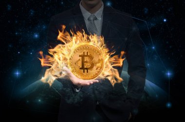 Bitcoin mockup tutan işadamı el ağ hattı ile toprak parçası üzerinde ateş ve yıldız ve Samanyolu arka plan, Nasa, cryptocurrency kavramı bir şekilde döşenmiş bu görüntü unsurları üzerinde nokta