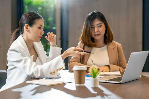 Two Asian Businesswomen Working Partner Business Point Pen Technology Laptop — 스톡 사진