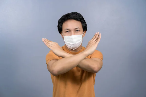 Portret Van Aziatische Mannen Die Een Gezichtsmasker Dragen Zeggen Geen — Stockfoto