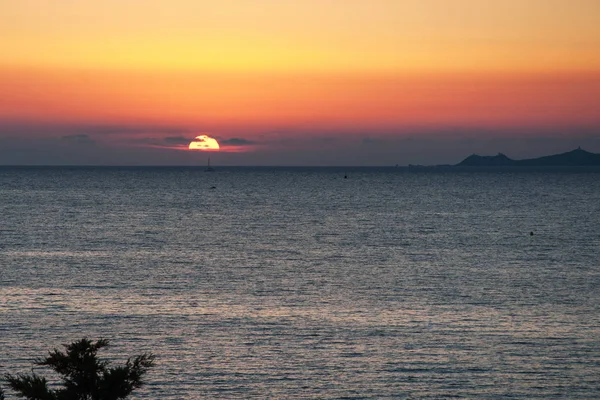Sunset near the shore of Corsica — Stock Photo, Image