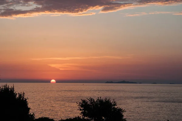 Sonnenuntergang nahe der Küste von Korsika — Stockfoto