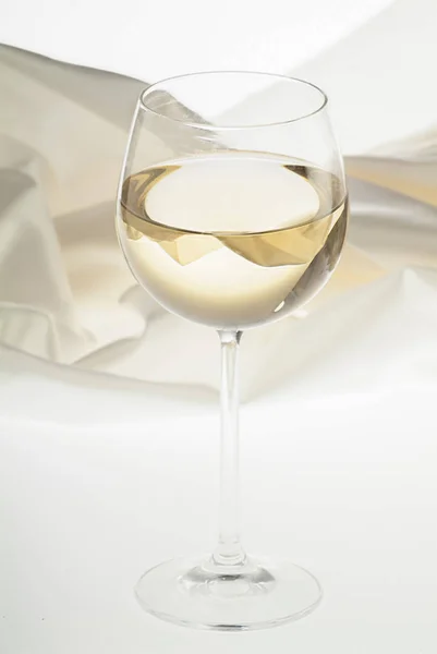 White wine on white background — Stock Photo, Image