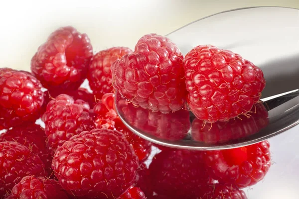 Fresh Juicy Raspberries Pile Glass Bowl Shiny Spoon Taken Out — Stock Photo, Image