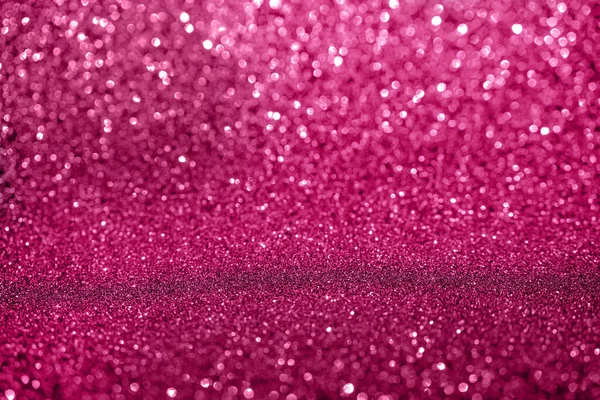 Pembe bokeh ışıldar arkaplan.